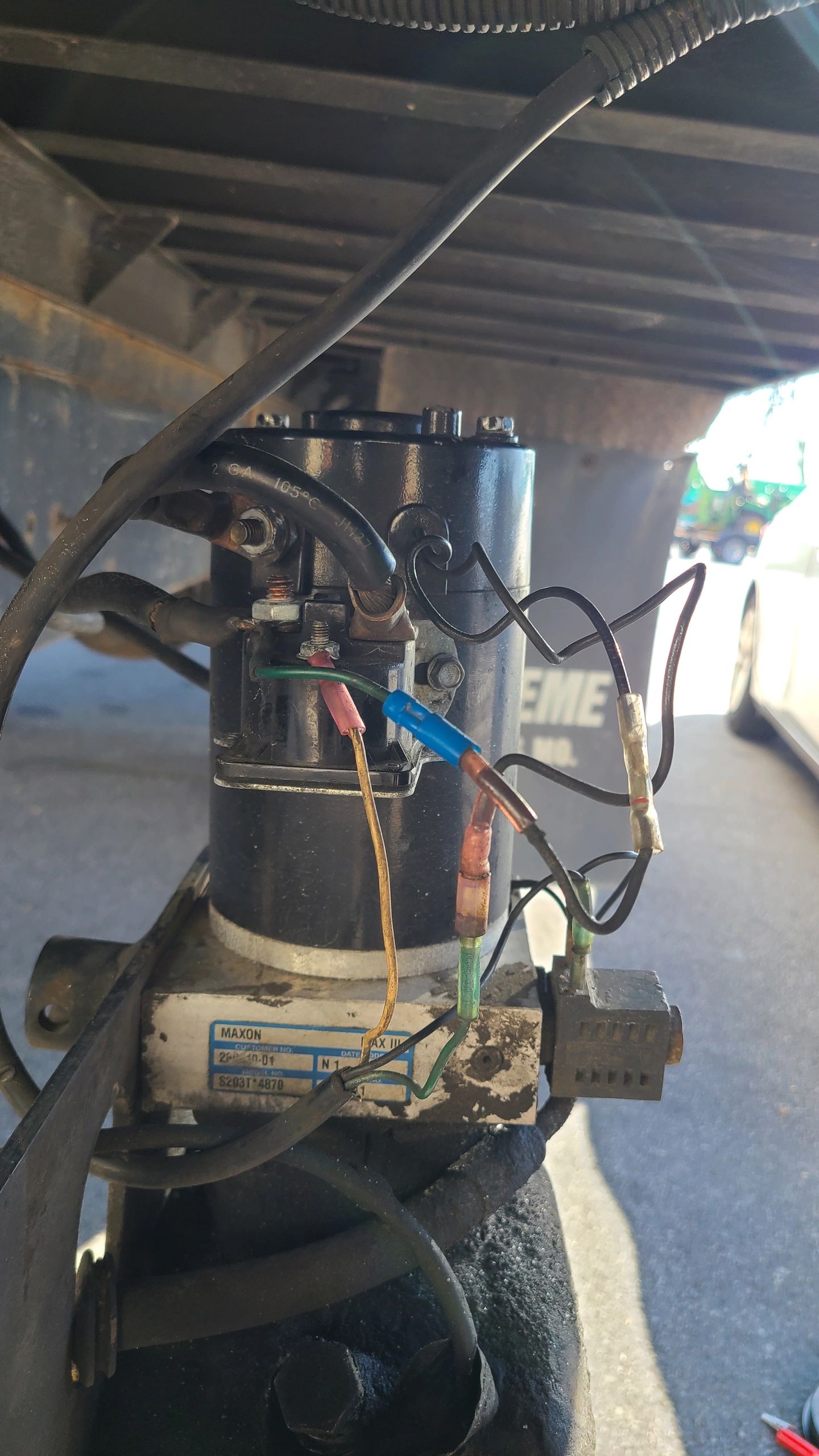 Tech On The Way — commercial box-truck Maxon liftgate motor repair with rewired electrical harness under the trailer chassis